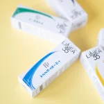 Primo piano del flacone da 30 ml di olio corpo Linea55 Tristezza con contagocce.